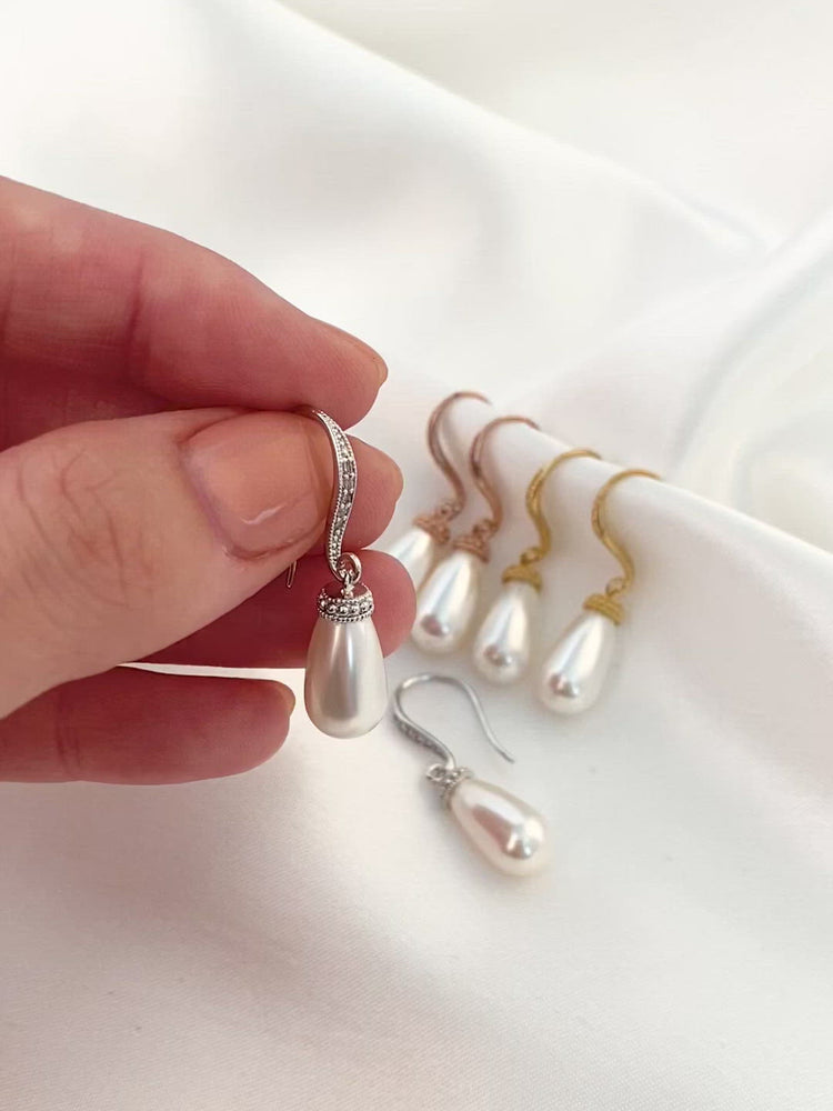 
            
                Load and play video in Gallery viewer, Classic Teardrop Pearl Earrings
            
        