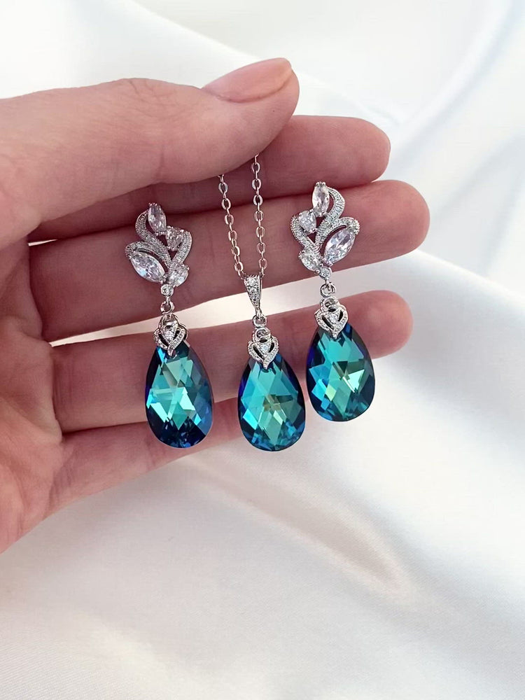 
            
                Load and play video in Gallery viewer, Bermuda Blue Crystal Earrings
            
        