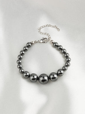 
            
                Load image into Gallery viewer, Graduated Pearl Bracelet | Grey
            
        